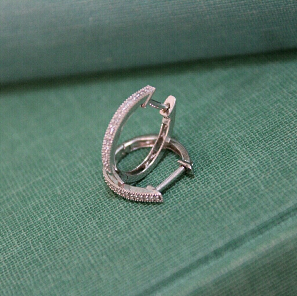 Zales silver and diamond leverback hoops.